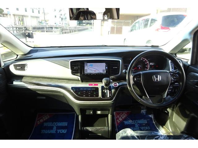 オデッセイ アブソルート・ＥＸホンダセンシング　ＳＤナビ　地デジ　Ｂカメラ　後席モニター　衝突被害軽減　車線逸脱防止　アダプティブクルコン　ＢＳＭ　ハーフレザーパワーシート　７人乗オットマン　ＵＳＢポート　１８ＡＷ　両側自動ドア　全国対応２年保証（6枚目）