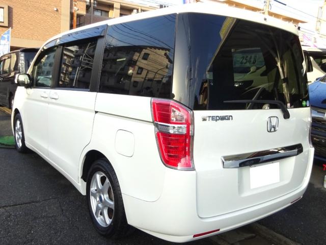 ステップワゴン Ｇ　インターナビＥセレクション　ＨＤＤインターナビ　地デジ　Ｂカメラ　後席モニター　クルーズコントロール　アイドリングストップ　ＵＳＢポート　純正カーテン　８人乗り　両側自動ドア　全国対応２年保証（5枚目）