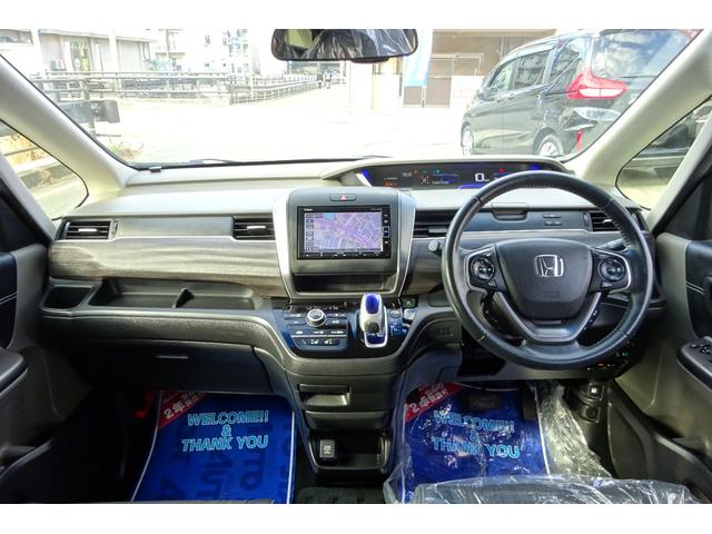 フリードハイブリッド ハイブリッド・ＥＸ　ホンダセンシング　ＳＤナビ　地デジ　Ｂカメラ　ＢＴ　衝突被害軽減　車線逸脱防止　アダクティブクルコン　シートヒーター　ハーフレザーシート　６人乗ウォークスルー　１５ＡＷ　両側自動ドア　全国対応２年保証（6枚目）