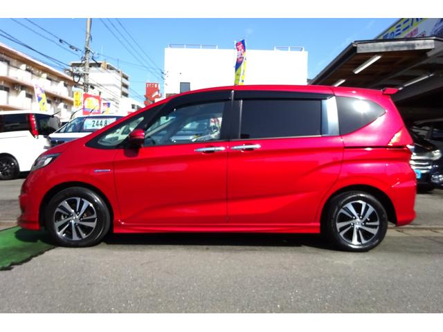 フリードハイブリッド ハイブリッド・ＥＸ　純正エアロ　メモリーナビ　地デジ　Ｂカメラ　ＢＴ　衝突被害軽減　車線逸脱防止　アダクティブクルコン　ＨＤＭＩ　ＵＳＢポート　ハーフレザーＳ　シートヒーター　前後Ｄレコ　両側自動ドア　全国対応２年保証（3枚目）