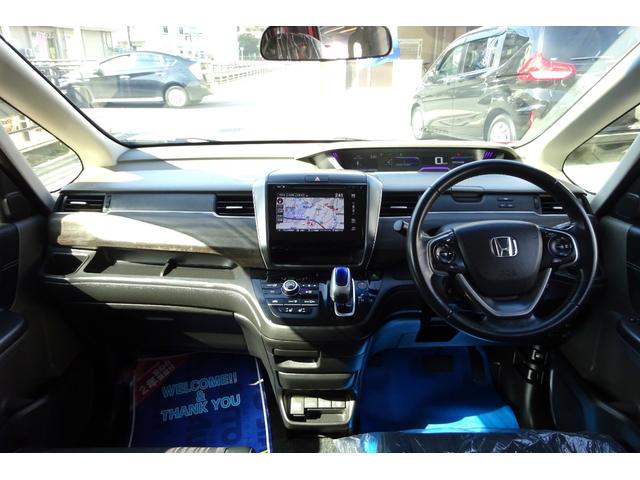 フリードハイブリッド ハイブリッド・ＥＸ　純正エアロ　メモリーナビ　地デジ　Ｂカメラ　ＢＴ　衝突被害軽減　車線逸脱防止　アダクティブクルコン　ＨＤＭＩ　ＵＳＢポート　ハーフレザーＳ　シートヒーター　前後Ｄレコ　両側自動ドア　全国対応２年保証（6枚目）