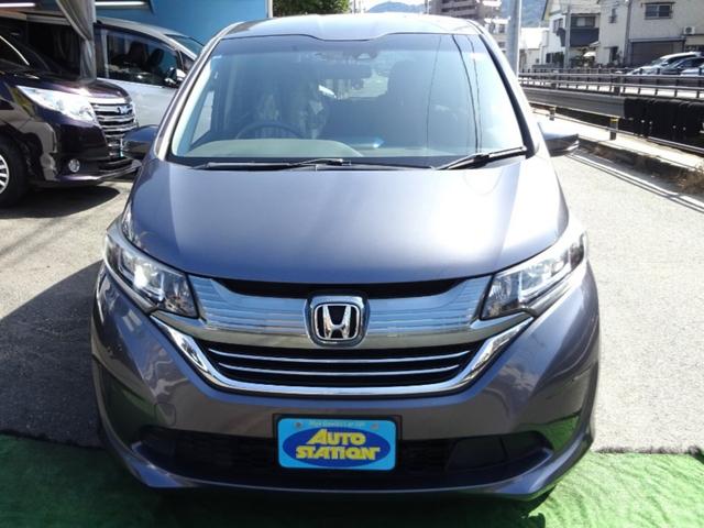 フリードハイブリッド ハイブリッド・Ｇホンダセンシング　ＳＤナビ　地デジ　Ｂカメラ　後席モニター　Ｂｌｕｅｔｏｏｔｈ　衝突被害軽減　車線逸脱防止　アダプティブクルコン　６人乗りウォークスルー　ドラレコ　ＬＥＤライト　両側自動ドア　全国対応２年保証（2枚目）