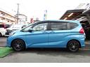 フリード+ハイブリッド ハイブリッドG・ホンダセンシング 9型SDナビ 地デジ Bカメラ BT 衝突被害軽減 車線逸脱防止 アダプティブクルーズコントロール 5人乗り LEDライト スマートキー 社外15AW 両側自動ドア 全国対応2年保証 中古車画像_3