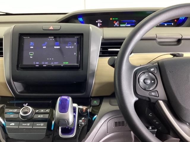 フリードハイブリッド ハイブリッド・Ｇホンダセンシング　ナビ　Ｒカメラ　ブルートゥース　フルセグ　キーフリーシステム　記録簿　ＥＣＯＮ　後カメラ　Ａクルーズ　ＬＥＤヘッドランプ　横滑防止　パワーウインドウ　ＥＴＣ付　両席エアバック　エアバッグ　パワステ（3枚目）