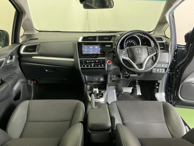 フィットハイブリッド Ｌホンダセンシング　ドラレコ　ナビ　Ｒカメラ　ブルートゥース　軽減ブレーキ　ＬＥＤ　サイドＳＲＳ　横滑り防止　ドライブレコーダー　フルセグテレビ　記録簿　パワーステアリング　盗難防止装置　オートクルーズ　ＥＴＣ車載器（2枚目）