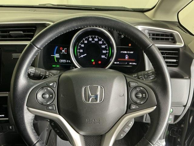 フィットハイブリッド Ｌホンダセンシング　ドラレコ　ナビ　Ｒカメラ　ブルートゥース　軽減ブレーキ　ＬＥＤ　サイドＳＲＳ　横滑り防止　ドライブレコーダー　フルセグテレビ　記録簿　パワーステアリング　盗難防止装置　オートクルーズ　ＥＴＣ車載器（21枚目）