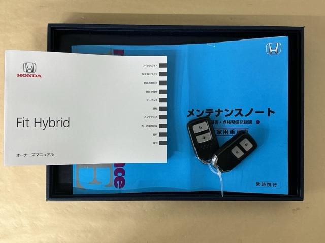 フィットハイブリッド Ｌホンダセンシング　ドラレコ　ナビ　Ｒカメラ　ブルートゥース　軽減ブレーキ　ＬＥＤ　サイドＳＲＳ　横滑り防止　ドライブレコーダー　フルセグテレビ　記録簿　パワーステアリング　盗難防止装置　オートクルーズ　ＥＴＣ車載器（29枚目）