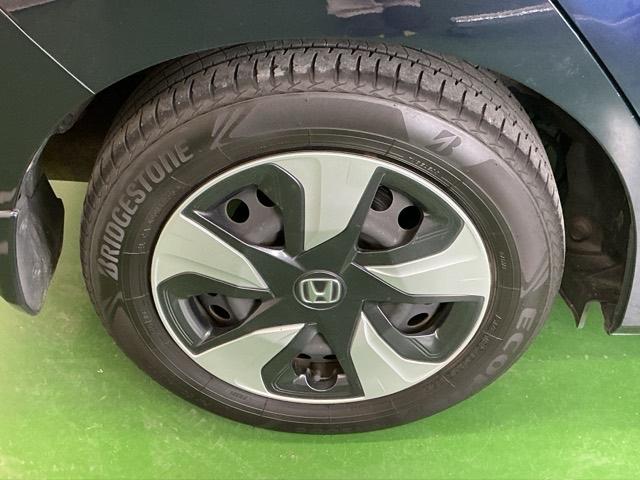 フィットハイブリッド Ｌホンダセンシング　ドラレコ　ナビ　Ｒカメラ　ブルートゥース　軽減ブレーキ　ＬＥＤ　サイドＳＲＳ　横滑り防止　ドライブレコーダー　フルセグテレビ　記録簿　パワーステアリング　盗難防止装置　オートクルーズ　ＥＴＣ車載器（31枚目）