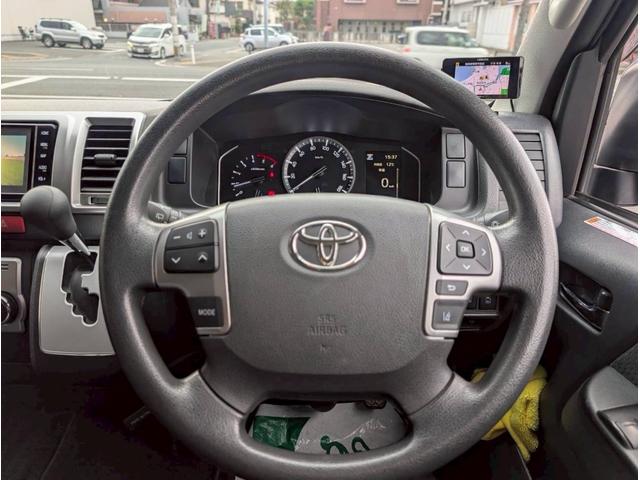 ハイエースバン ロングスーパーＧＬ　モデリスタフルエアロ　両側パワースライドドア　純正ＳＤナビ　バックカメラ　ルームミラーカメラ　助手席エアバッグ　純正ＥＴＣ　ＡＣ１００Ｖ　純正マット　サイドバイザー　室内カーテン　ＬＥＤヘッドランプ（24枚目）