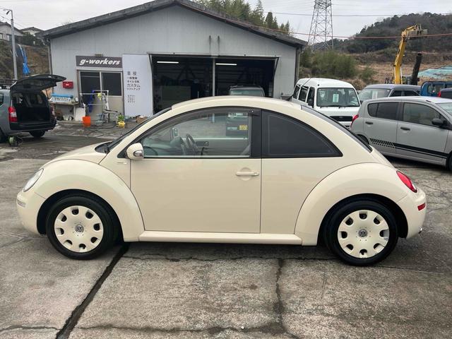 ニュービートル ＥＺ　ドアパネル張替　ドアハンドル交換　ロアグリル交換　バックドアダンバイン交換　地デジチューナー　ナビ　ドライブレコーダー　バックカメラ　ナビ　ＴＶ　ＡＴ　盗難防止システム　ＡＢＳ　ＣＤ　ＤＶＤ再生（14枚目）
