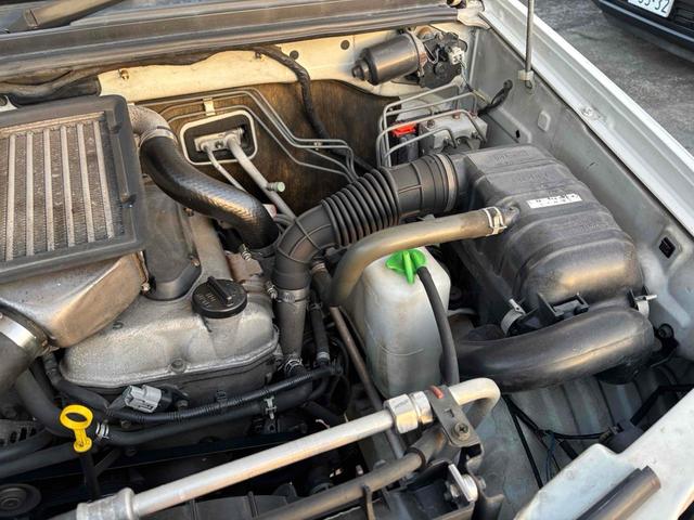 ジムニー ランドベンチャー 4WD MT ABS CD MD リフトアップ ハセスぺアルミホイール 衝突安全ボディ エアコン パワーウィンドウ(28枚目)