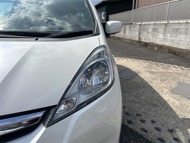 フィット X ナビ TV バックカメラ オートクルーズコントロール アルミホイール オートライト スマートキー 電動格納ミラー シートヒーター CVT 盗難防止システム 衝突安全ボディ ABS CD DVD再生(21枚目)