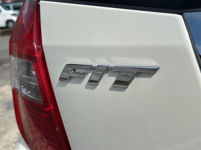 フィット X ナビ TV バックカメラ オートクルーズコントロール アルミホイール オートライト スマートキー 電動格納ミラー シートヒーター CVT 盗難防止システム 衝突安全ボディ ABS CD DVD再生(26枚目)