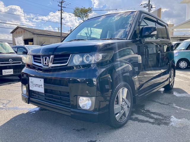 ゼストスパーク W 純正ナビ 地デジ DVD再生 バックカメラ ETC HIDヘッドライト フォグ スマートキー オートエアコン 純正アルミホイール プライバシーガラス セキュリティアラーム フロアマット サイドバイザー(3枚目)