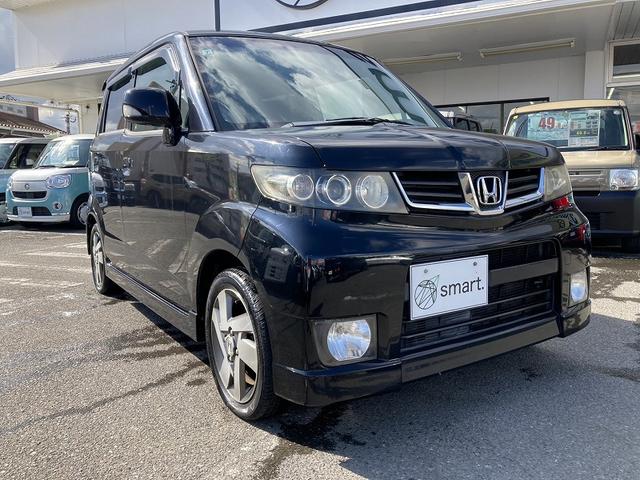 ゼストスパーク W 純正ナビ 地デジ DVD再生 バックカメラ ETC HIDヘッドライト フォグ スマートキー オートエアコン 純正アルミホイール プライバシーガラス セキュリティアラーム フロアマット サイドバイザー(5枚目)