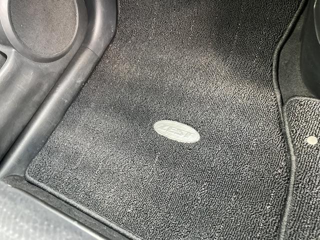 ゼストスパーク W 純正ナビ 地デジ DVD再生 バックカメラ ETC HIDヘッドライト フォグ スマートキー オートエアコン 純正アルミホイール プライバシーガラス セキュリティアラーム フロアマット サイドバイザー(26枚目)