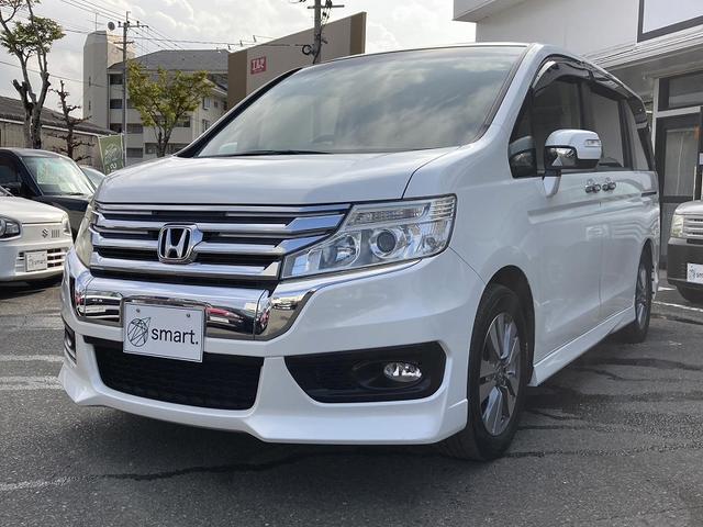 ステップワゴンスパーダ Ｚ　両側パワースライドドア　純正９インチナビ　フルセグ　ＤＶＤ再生バックカメラ　ＥＴＣ　前後ドライブレコーダー　ＨＩＤヘッドライト　フォグ　スマートキー　横滑防止　パドルシフト　プライバシーガラス（3枚目）