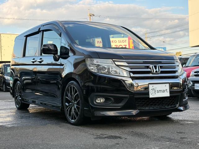 ステップワゴンスパーダ 　後期　９型ナビ　フルセグ／ＢＴ　両側電スラ　Ｂカメラ　ＥＴＣ　社外１８ＡＷ　Ｐシフト　クルコン　ステリモＨＩＤライト　Ａライト　フォグ　Ａストップ　スマートキー　Ｐガラス　シートリフター　ＴＲＣ（2枚目）