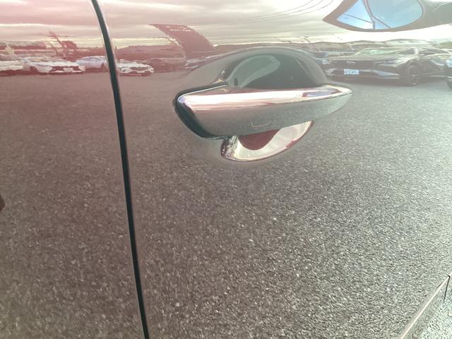 �X�}�[�g�L�[���������Ă����ԂŃ��b�N�{�^���������ƁA�ԗ����ׂẴh�A�̉�����{�����s�����Ƃ��o���܂��B