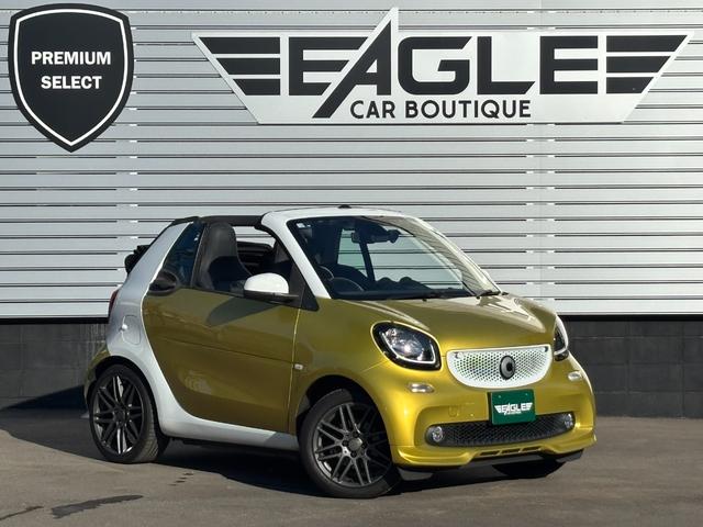 スマートフォーツーカブリオ ＢＲＡＢＵＳ　スポーツ　社外９インチナビ　黒革シート　シートヒーター　ＴＶ　Ｂカメラ　ＣＤ・ＤＶＤ・Ｂｌｕｅｔｏｏｔｈ　衝突軽減ブレーキ　レーンキープ　障害物センサ　純正１６インチＡＷ　パドルシフト　クルコン　全方位ドラレコ（5枚目）