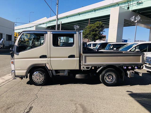 キャンター ダブルキャブロング全低床 最大積載量1500Kg 原動機の型式4P10 社外オーディオ CD キーレスエントリー ベンチシート フォグランプ 電動格納ミラー 全低床 Ad Blue パワーウインドウ パワーステアリング(14枚目)