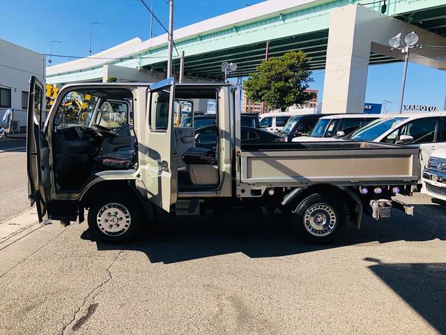 キャンター ダブルキャブロング全低床 最大積載量1500Kg 原動機の型式4P10 社外オーディオ CD キーレスエントリー ベンチシート フォグランプ 電動格納ミラー 全低床 Ad Blue パワーウインドウ パワーステアリング(36枚目)