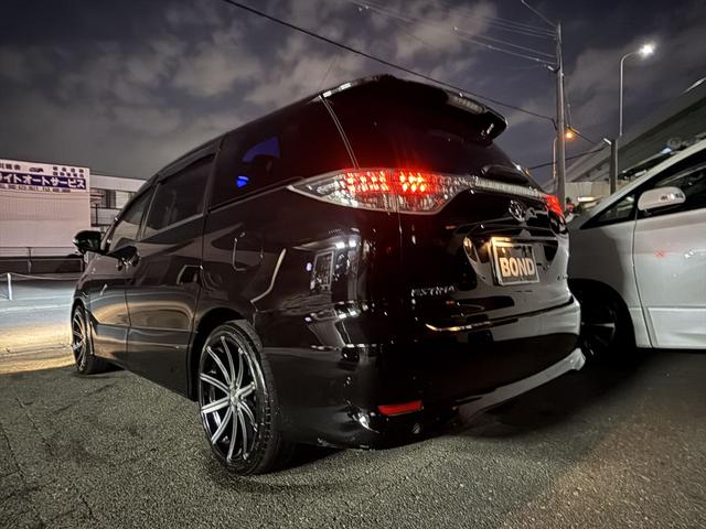 エスティマ アエラス　後席モニター　社外２０インチアルミホイール　両側パワースライドドア　社外ナビ　ＤＶＤ　Ｂｌｕｅｔｏｏｔｈ　ＥＴＣ　バックカメラ　プッシュスタート　スマートキー　オットマン　ＨＩＤヘッドライト（8枚目）