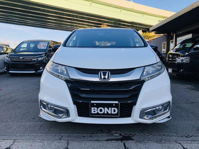 オデッセイ アブソルート　両側パワースライドドア　社外９インチナビ　ＤＶＤ　Ｂｌｕｅｔｏｏｔｈ　ＥＴＣ　プッシュスタート　スマートキー　キーレスエントリー　オットマン　ＬＥＤヘッドライト　フォグランプ　純正１８ＡＷ（12枚目）