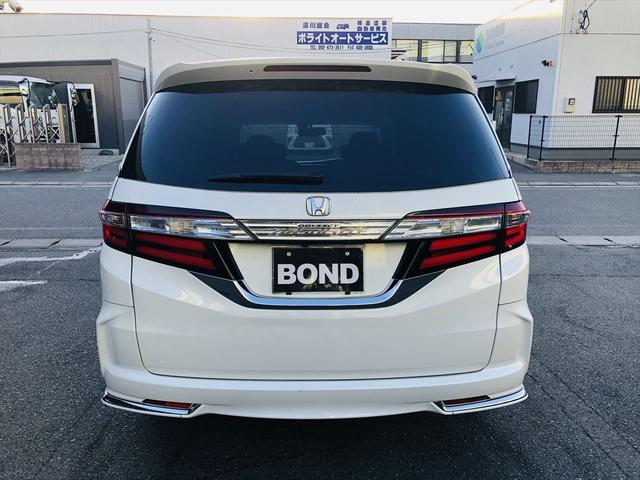 オデッセイ アブソルート　両側パワースライドドア　社外９インチナビ　ＤＶＤ　Ｂｌｕｅｔｏｏｔｈ　ＥＴＣ　プッシュスタート　スマートキー　キーレスエントリー　オットマン　ＬＥＤヘッドライト　フォグランプ　純正１８ＡＷ（13枚目）