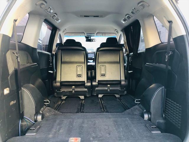 オデッセイ アブソルート　両側パワースライドドア　社外９インチナビ　ＤＶＤ　Ｂｌｕｅｔｏｏｔｈ　ＥＴＣ　プッシュスタート　スマートキー　キーレスエントリー　オットマン　ＬＥＤヘッドライト　フォグランプ　純正１８ＡＷ（66枚目）