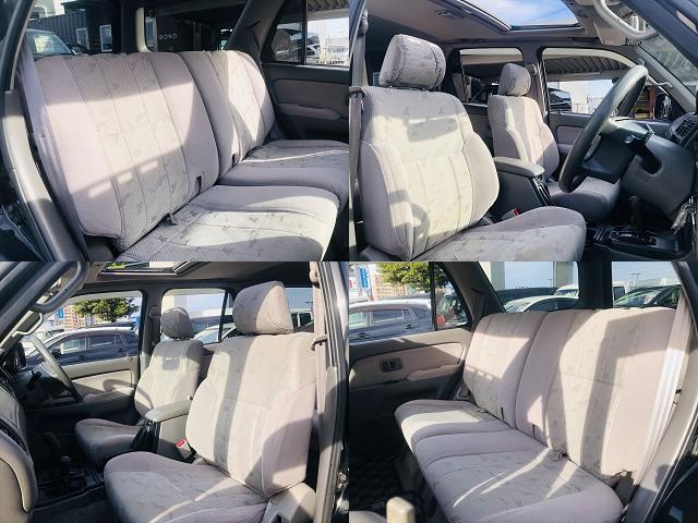 ハイラックスサーフ ＳＳＲ－Ｘ　サンルーフ　４ＷＤ　社外ナビ　フルセグＴＶ　ＤＶＤ　Ｂｌｕｅｔｏｏｔｈ　ＥＴＣ　キーレスエントリー　リアパワーウインドウ　社外１６インチアルミホイール　電動格納ミラー　フルフラットシート（8枚目）