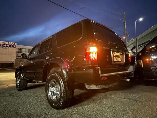 ハイラックスサーフ ＳＳＲ－Ｘ　サンルーフ　４ＷＤ　社外ナビ　フルセグＴＶ　ＤＶＤ　Ｂｌｕｅｔｏｏｔｈ　ＥＴＣ　キーレスエントリー　リアパワーウインドウ　社外１６インチアルミホイール　電動格納ミラー　フルフラットシート（34枚目）