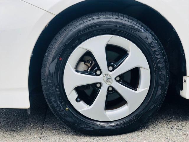 プリウス Ｌ　社外ナビ　ＤＶＤ　ＥＴＣ　プッシュスタート　キーレスエントリー　電動格納ミラー　純正１５インチアルミホイール　盗難防止システム　衝突安全ボディ　パワーステアリング　パワーウインドウ（69枚目）