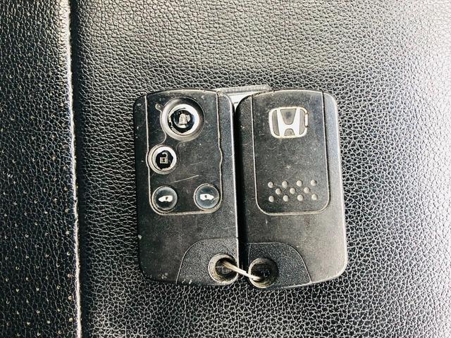 ステップワゴンスパーダ Ｚ　クールスピリット　後席モニター　両側パワースライドドア　ドライブレコーダー　純正ナビ　フルセグＴＶ　ＤＶＤ　ＥＴＣ　バックカメラ　スマートキー　ＨＩＤヘッドライト　フォグランプ　純正１７インチアルミホイール（56枚目）