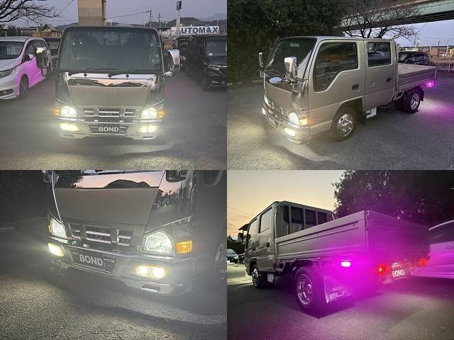 エルフトラック ４．８ダブルキャブ　低床　ディーゼル　５速マニュアル　メッキパーツ　ＥＴＣ　バックカメラ　ＨＩＤヘッドライト　左電動格納ミラー　パワーステアリング　パワーウインドウ　運転席エアバック　純正ラジオ（5枚目）