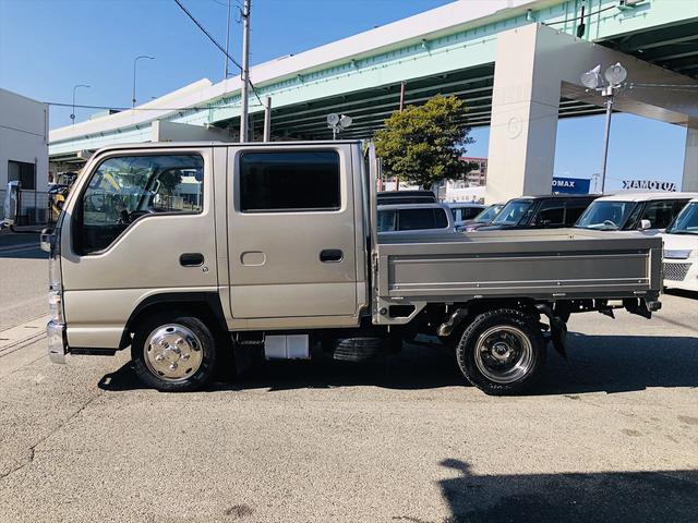 エルフトラック ４．８ダブルキャブ　低床　ディーゼル　５速マニュアル　メッキパーツ　ＥＴＣ　バックカメラ　ＨＩＤヘッドライト　左電動格納ミラー　パワーステアリング　パワーウインドウ　運転席エアバック　純正ラジオ（14枚目）