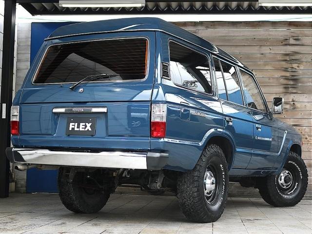 ランドクルーザー６０ ＶＸ　走行１９．１万ｋｍ　ディーゼルターボ　丸目フェイス　ナローボディー　ハイルーフ　輸出用１５ｉｎｃｈスチールホイール＆ＢＦグッドリッチＫＯ２　公認リフトアップ　ＮＡＲＤＩウッドステアリング　シートカバー（8枚目）