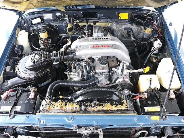 ランドクルーザー６０ ＶＸ　走行１９．１万ｋｍ　ディーゼルターボ　丸目フェイス　ナローボディー　ハイルーフ　輸出用１５ｉｎｃｈスチールホイール＆ＢＦグッドリッチＫＯ２　公認リフトアップ　ＮＡＲＤＩウッドステアリング　シートカバー（12枚目）