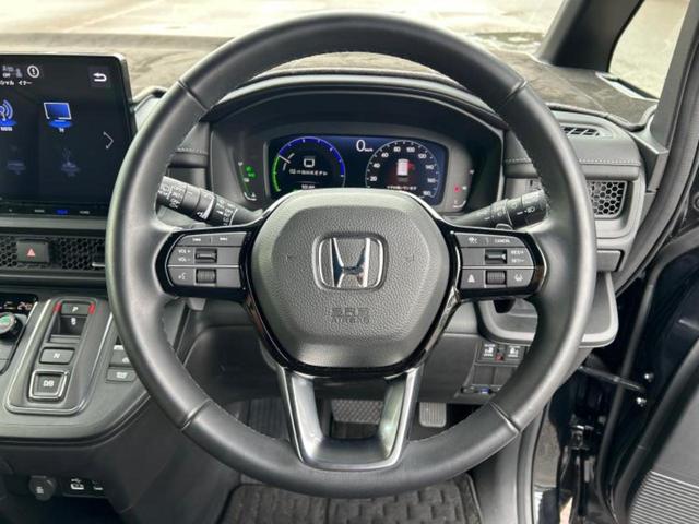 ステップワゴン ｅＨＥＶスパーダ　保証書／純正　１１インチ　ＳＤナビ／ホンダセンシング／両側電動スライドドア／シートヒーター　前席／車線逸脱防止支援システム／シート　ハーフレザー／パーキングアシスト　バックガイド　衝突被害軽減システム（14枚目）