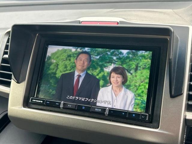 フリードスパイクハイブリッド ハイブリッドプレミアムエディション　社外　ＳＤナビ／フリップダウンモニター／両側電動スライドドア／シート　合皮／ヘッドランプ　ＨＩＤ／ＥＴＣ／ＥＢＤ付ＡＢＳ／横滑り防止装置／アイドリングストップ／フルセグＴＶ／エアバッグ　運転席（11枚目）