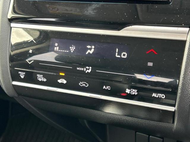 フィットハイブリッド ハイブリッド・Lホンダセンシング 新品タイヤ/保証書/純正 SDナビ/車線逸脱防止支援システム/シート 合皮/ヘッドランプ LED/USBジャック/Bluetooth接続/ETC/EBD付ABS/横滑り防止装置 バックカメラ(30枚目)