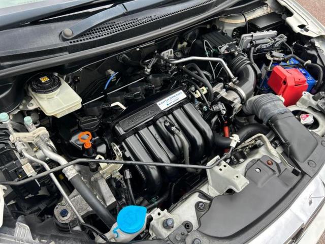 フィットハイブリッド ハイブリッド・Lホンダセンシング 新品タイヤ/保証書/純正 SDナビ/車線逸脱防止支援システム/シート 合皮/ヘッドランプ LED/USBジャック/Bluetooth接続/ETC/EBD付ABS/横滑り防止装置 バックカメラ(55枚目)