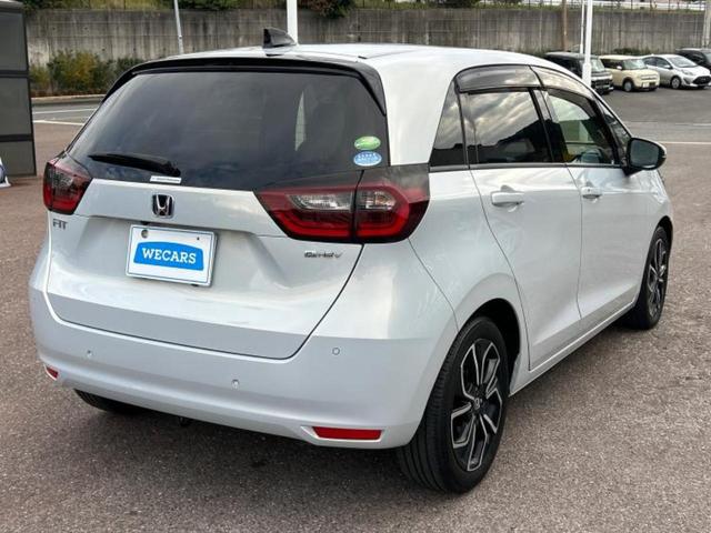 フィット ｅＨＥＶホーム　新品タイヤ／保証書／ディスプレイオーディオ＋ナビ９インチ／ホンダセンシング／車線逸脱防止支援システム／シート　ハーフレザー／パーキングアシスト　バックガイド／ドライブレコーダー　前後　バックカメラ（3枚目）