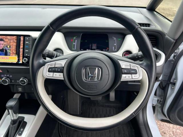 フィット ｅＨＥＶホーム　新品タイヤ／保証書／ディスプレイオーディオ＋ナビ９インチ／ホンダセンシング／車線逸脱防止支援システム／シート　ハーフレザー／パーキングアシスト　バックガイド／ドライブレコーダー　前後　バックカメラ（14枚目）