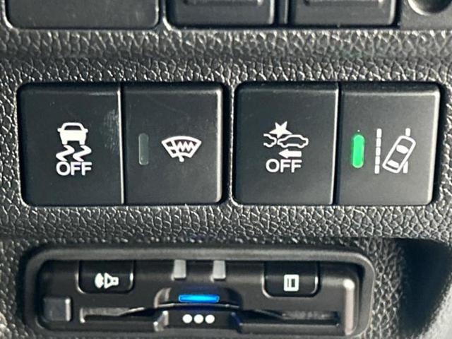 フリード Ｇブラックスタイル　新品タイヤ／純正エアロ／保証書／純正　８インチ　ＳＤナビ／衝突安全装置／両側電動スライドドア／シートヒーター／車線逸脱防止支援システム／ヘッドランプ　ＬＥＤ／Ｂｌｕｅｔｏｏｔｈ接続／ＥＴＣ　フルエアロ（28枚目）