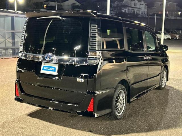 ヴォクシー ハイブリッドＺＳキラメキ３　保証書／社外　９インチ　ＳＤナビ／フリップダウンモニター／衝突安全装置／両側電動スライドドア／シートヒーター／車線逸脱防止支援システム／シート　合皮／ドライブレコーダー　社外／ヘッドランプ　ＬＥＤ（3枚目）