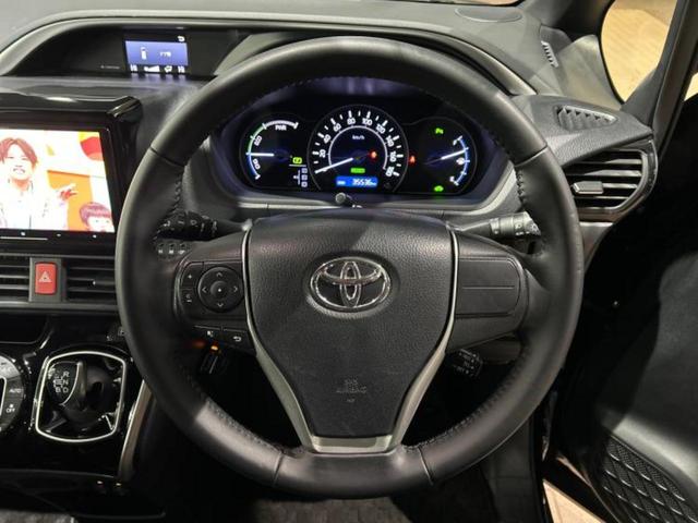 ヴォクシー ハイブリッドＺＳキラメキ３　保証書／社外　９インチ　ＳＤナビ／フリップダウンモニター／衝突安全装置／両側電動スライドドア／シートヒーター／車線逸脱防止支援システム／シート　合皮／ドライブレコーダー　社外／ヘッドランプ　ＬＥＤ（14枚目）