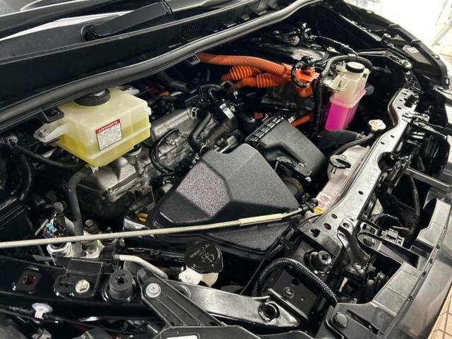 ヴォクシー ハイブリッドＺＳキラメキ３　保証書／社外　９インチ　ＳＤナビ／フリップダウンモニター／衝突安全装置／両側電動スライドドア／シートヒーター／車線逸脱防止支援システム／シート　合皮／ドライブレコーダー　社外／ヘッドランプ　ＬＥＤ（52枚目）