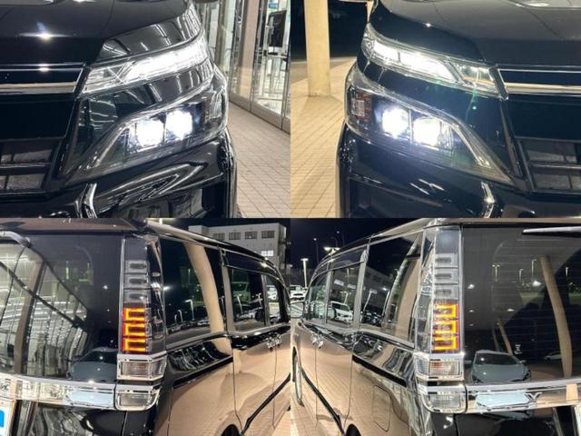 ヴォクシー ハイブリッドＺＳキラメキ３　保証書／社外　９インチ　ＳＤナビ／フリップダウンモニター／衝突安全装置／両側電動スライドドア／シートヒーター／車線逸脱防止支援システム／シート　合皮／ドライブレコーダー　社外／ヘッドランプ　ＬＥＤ（56枚目）