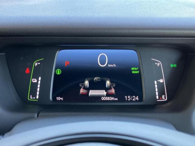 フィット ｅＨＥＶホーム　純正　９インチ　ナビ／ホンダセンシング／車線逸脱防止支援システム／シート　ハーフレザー／ヘッドランプ　ＬＥＤ／ＵＳＢジャック／Ｂｌｕｅｔｏｏｔｈ接続／ＥＴＣ／ＥＢＤ付ＡＢＳ／横滑り防止装置　ＤＶＤ再生（12枚目）